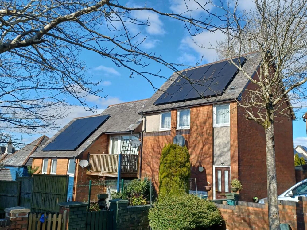 Solar panels installed across residential roofs